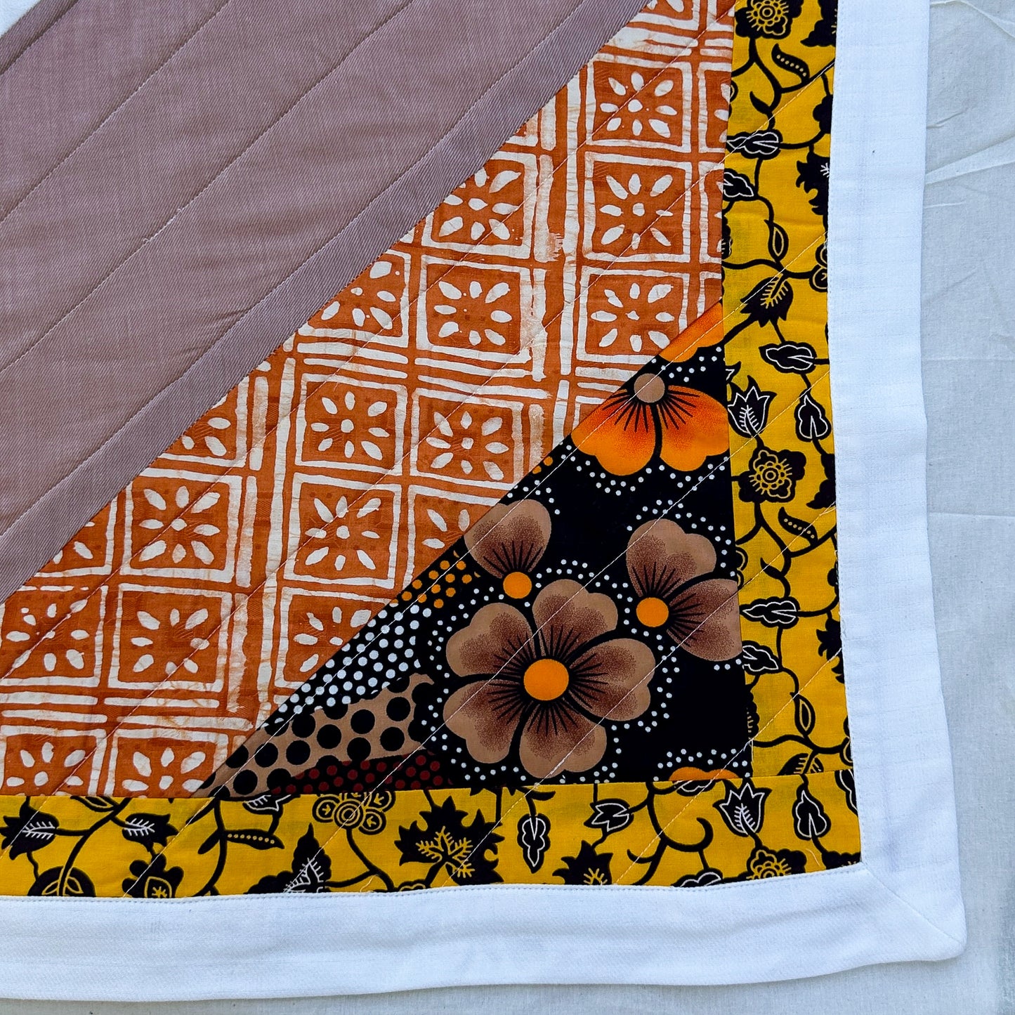 Joy Baby Quilt - Yellow + Orange Batik Flowers