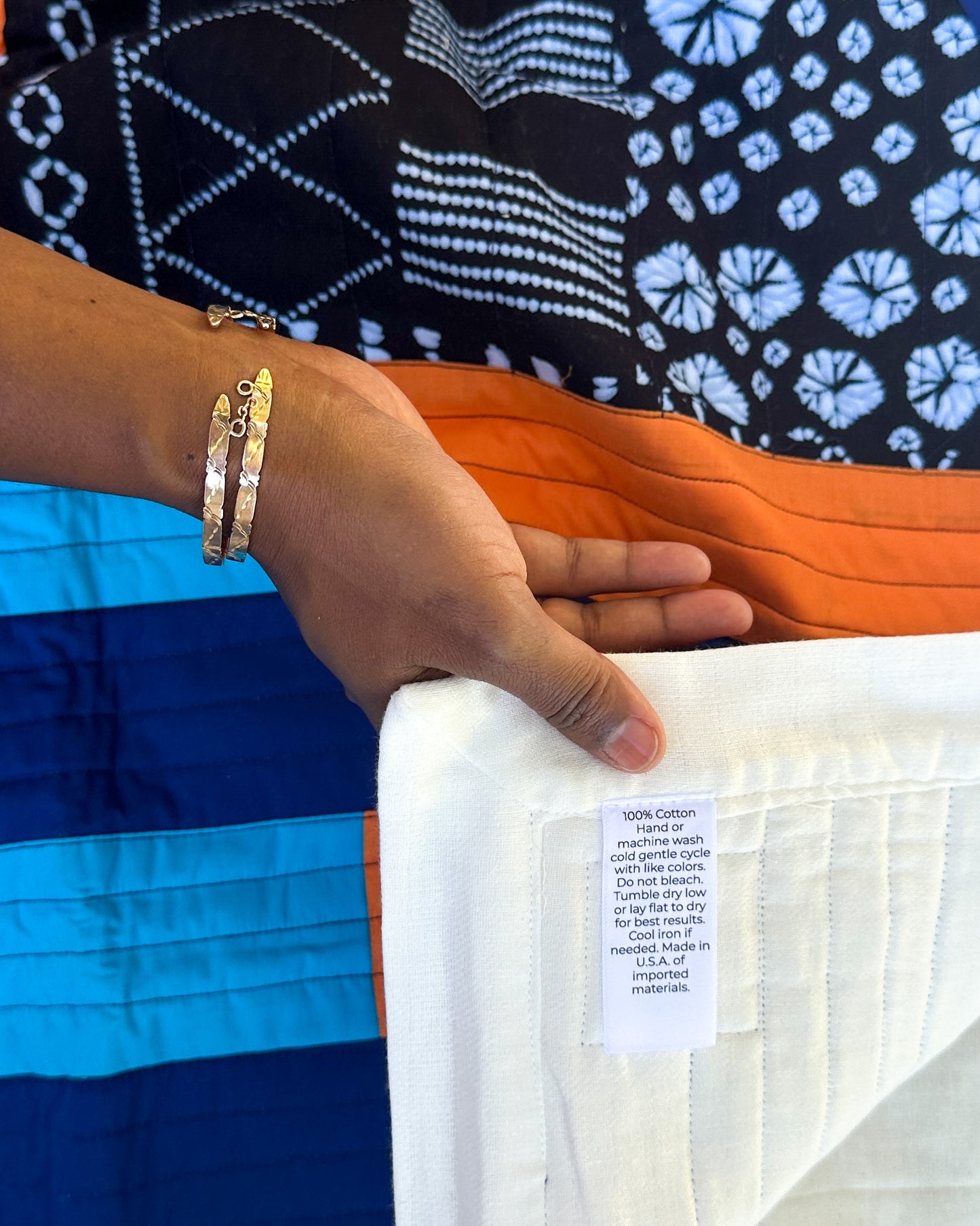 Abundance Baby Quilt - Black + Blue with Orange Sun Ray