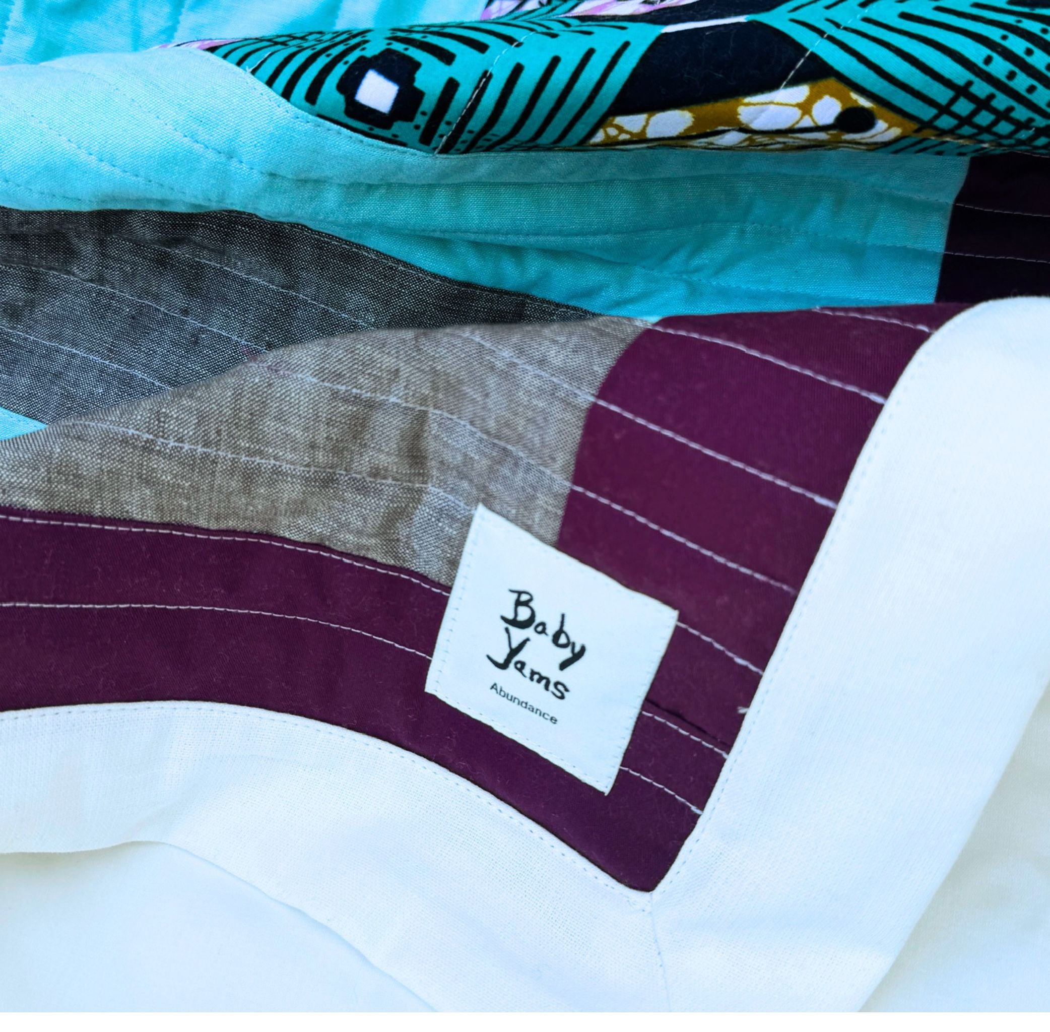 Abundance Quilt Mauve and Turquoise