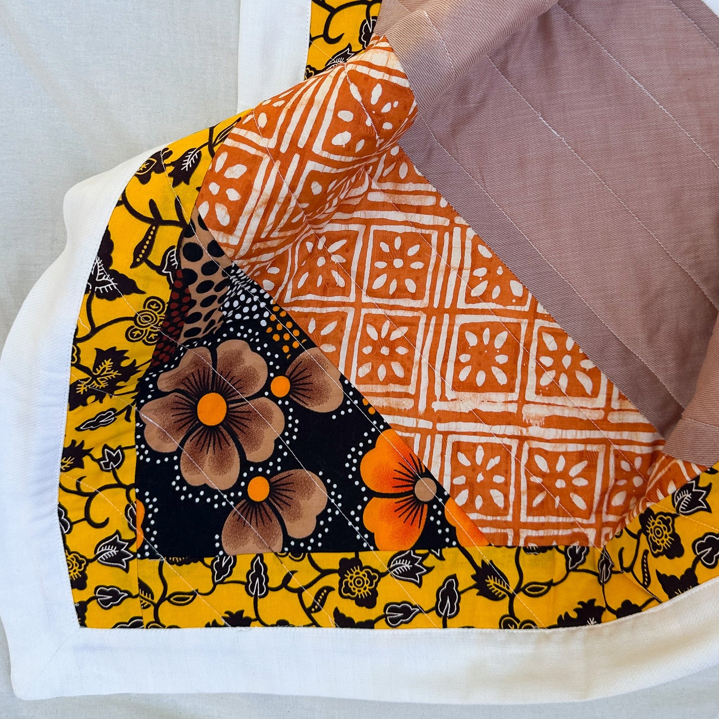 Joy Baby Quilt - Yellow + Orange Batik Flowers